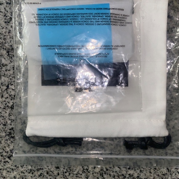 Sterling Silver Signature Hangtag Single Huggie Earring - Picture 10 of 11